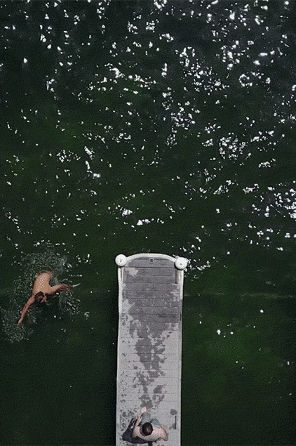 Man diving into the lake.